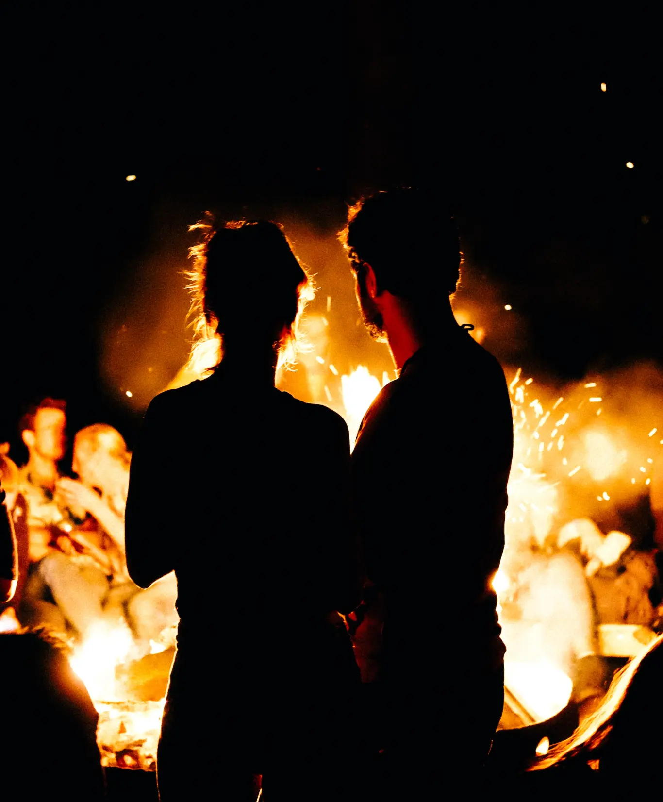 https://unsplash.com/photos/two-persons-standing-in-front-of-bonfire-xjS9YXVFTt4