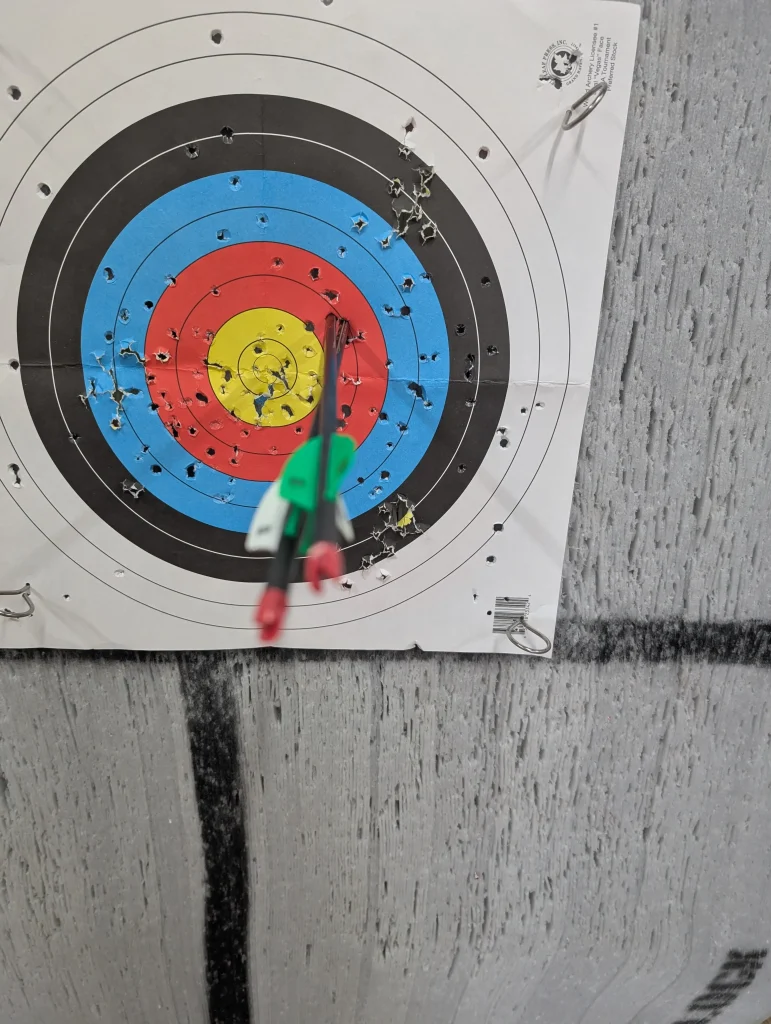 Chris’ crossed arrows, less than 2” from bullseye
